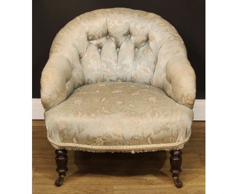 A Victorian drawing room low easy chair, stuffed-over upholstery, deep-button back, turned forelegs, 64.5cm high, 69cm wide, 