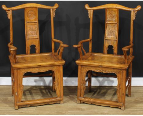 A pair of Chinese yumu yoke-back lamp-hanger armchairs, each splat carved and applied with auspicious symbols, serpentine arm