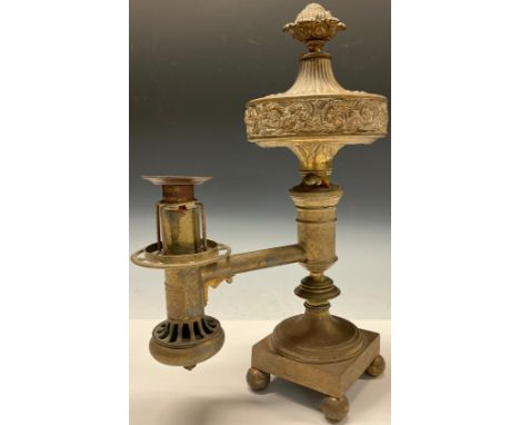 A Regency brass oil lamp,  stamped M. Rettie &amp; Son, patent Aberdeen, flower finial, fluted reservoir with band of cherubs