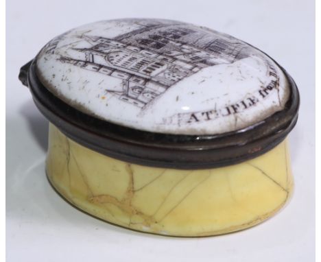 A George III South Staffordshire enamel oval patch box, A Trifle from Bath, hinged cover printed in monochrome with a view of