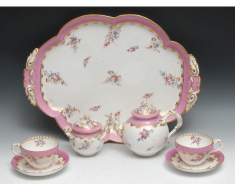 A Coalport cabaret set on tray, comprising lobed oval tray, globular teapot and cover, two cups and saucers and sucrier and c