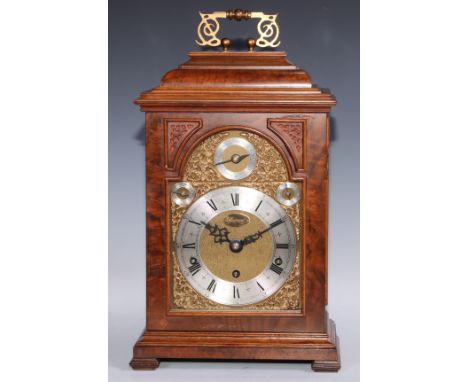 A George III design walnut bracket clock, 14cm silvered chapter ring with Roman numerals, Arabic subsidiary, three winding ho