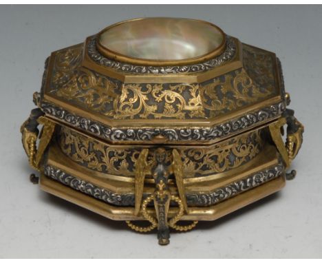 A 19th century French silvered and gilt brass lozenge shaped casket, in the Renaissance Revival taste, the hinged cover set w