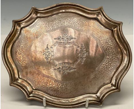 The Bateman Family - a George III silver commode shaped teapot stand, bright-cut engraved with wrigglework, reeded outswept  