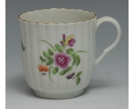 A Worcester reeded French shaped coffee cup, painted with colourful flowers and a ladybird, gilded border, c.1770  Robert and