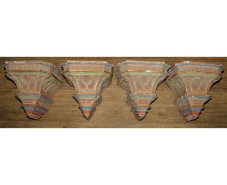 Architectural Salvage - a set of four French Gothic Revival eccclesiastical polychrome decorated corbels, 46cm high, 46.5cm w