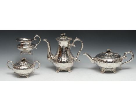 A Victorian style silver four piece melon shaped tea and coffee service, comprising teapot, milk jug and sucrier, each engrav