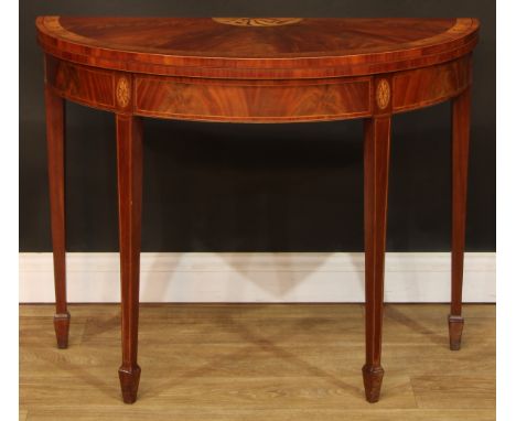 A George III mahogany and marquetry demilune card table, possibly Irish, in the manner of William Moore, Dublin, hinged arbut