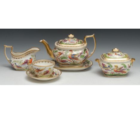 A Coalport four piece tea service, comprising boat shaped teapot and stand, sucrier and cover, milk jug, teacup and saucer, w