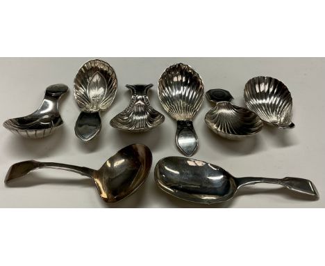 A George III silver caddy spoon, shell bowl, beaded handle with scroll terminal, 8cm long, Daniel Holy &amp; Co, Sheffield 17