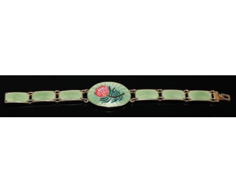 A David Andersen of Norway sterling silver and enamel bracelet, the central oval link inlaid with a protea blossom, flanked b