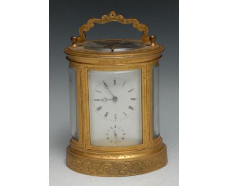 A good 19th century French Aiguilles repeater oval carriage alarm clock,  the dial with Roman numerals, subsidiary alarm dial