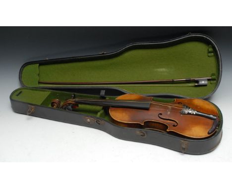 A German violin, the two-piece back 36cm excluding button, paper label printed Antonius Stradivarius, Deutsche Arbeit, ebonis