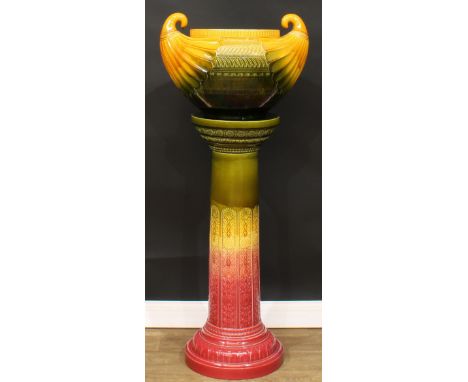 A large Egyptianesque jardiniere and pedestal, possibly designed by Christopher Dresser for Ault Pottery, 137.5cm high, c.189