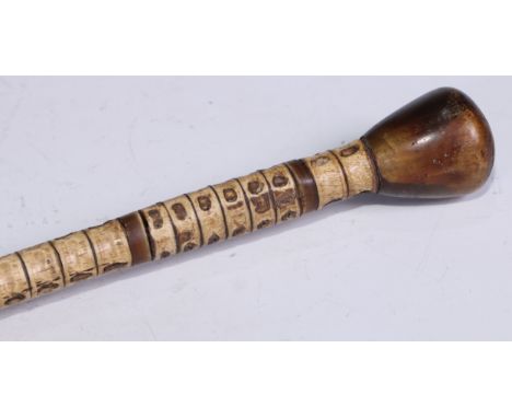 A 19th century vertebrae walking stick, domed horn pommel, 85cm long 