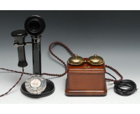 A candlestick telephone, 32cm high, brass and mahogany bell box 