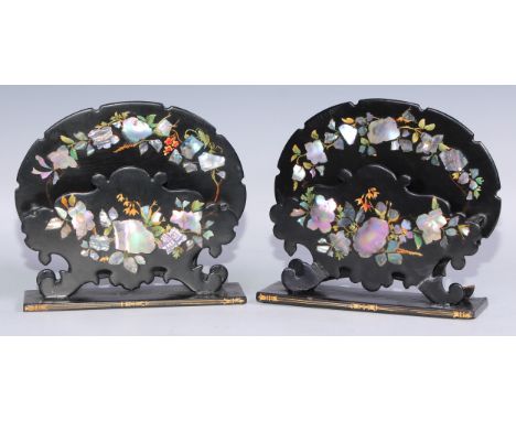 A pair of Victorian Jennens &amp; Bettridge papier mache letter racks, shaped backs inlaid in mother-of-pearl and painted wit