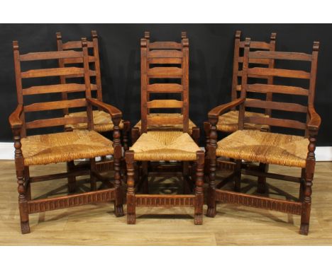 A set of six Rupert Griffiths Monastic Woodcraft oak ladder back dinings chairs, comprising four side chairs and a pair of ca