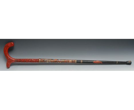 A 20th century Chinese cloisonne and cinnabar lacquered walking stick, in three sections, 95cm long 