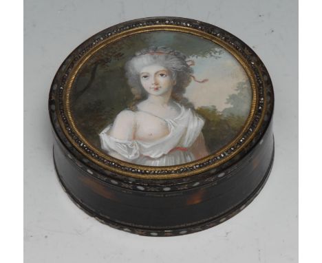 A late 18th century French tortoiseshell circular snuff box, the push-fitting cover with a gouache portrait miniature of a la