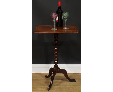 A 19th century mahogany wine table, rounded rectangular top with parquetry border, bobbin turned column, cabriole legs, 68.5c