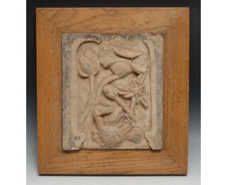A Chinese terracotta tile, of typical Yuan Dynasty form, 31.5cm x 26cm; another, similar, framed as a pair (2) 