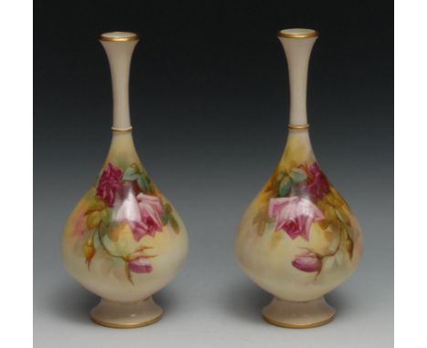 A pair of Royal Worcester bottle vases, painted by Sedgley, with roses in Hadley style, 24.5cm high, printed crown and circle