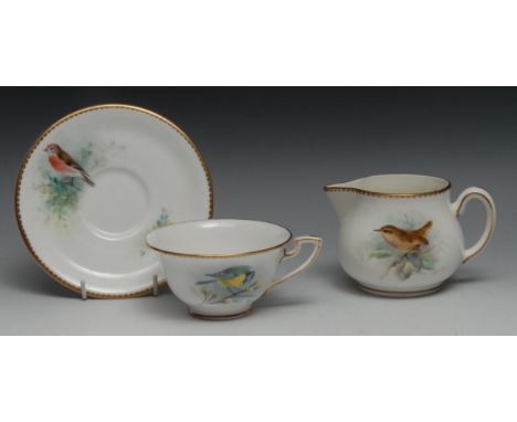A Royal Worcester cup and saucer,  painted by D. Jones, signed,with a Bluetit and Linnet, printed mark in black,  date code f