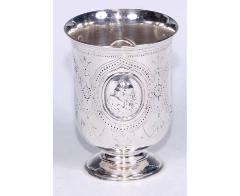 A Victorian silver pedestal beaker, in relief with portrait ovals of Neptune and Salacia, within Gothic strapwork, domed foot