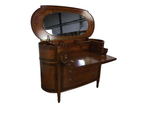CROSSBANDED BURR WALNUT COMMODE / DRESSING CHEST, CONTEMPORARY of oval form, the hinged top with inlay and mirror to undersid