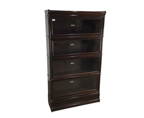 GLOBE WERNICKE, STAINED OAK SECTIONAL BOOKCASE, EARLY 20TH CENTURY comprising four sections with glazed sliding doors, each r