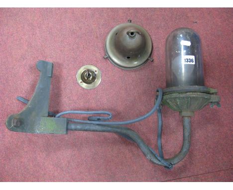 Simplex Wall Corner Light, circa early to mid XX Century, featuring glass dome on iron curved support and angular wall fittin