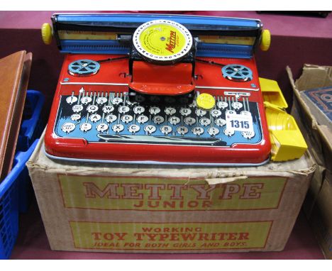 A 1950's Mettoy Junior Tinplate Typewriter, in original box.
