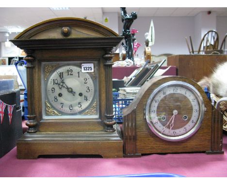 A Late XIX Century Mahogany Eight Day Mantel Clock, moulded arch pediment, central silvered dial with brass spandrels and Ara