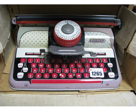 A 1950's Mettoy 'Elegant' Tinplate Typewriter, in original box.