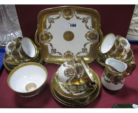 A Noritake Six Setting China Tea Service, heavy gilt decoration of foliate swags and border with cobalt blue highlights, on a