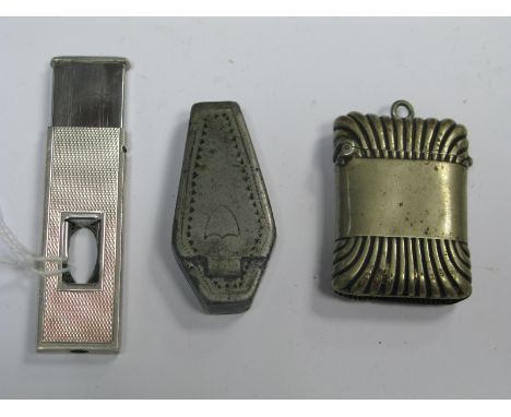 A Hallmarked Silver Cigar Cutter, engine turned; a plated vesta and a XIX Century coffin shape snuff box. (3)