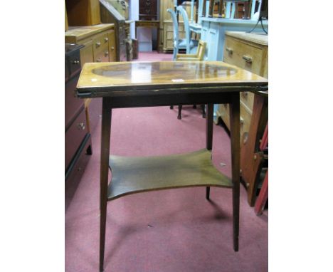 An Edwardian Inlaid Mahogany Fold Over Card Table, with baize inset to tooled Morocco boarder, on tapering splayed legs unite