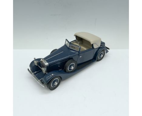 A beautifully detailed Danbury Mint die-cast replica of the luxurious 1934 Hispano-Suiza J12 Convertible, finished in an eleg