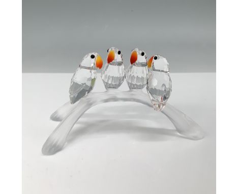 This lovely figurine features four baby lovebirds sitting on a branch and was part of the Feathered Beauties theme. The facet