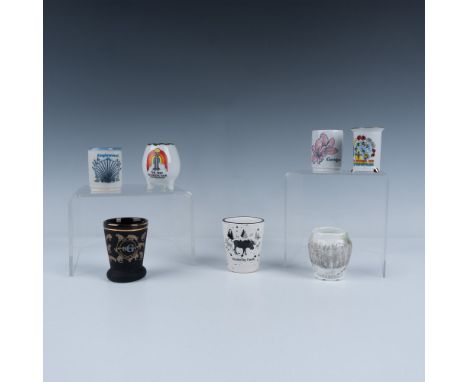 This set of seven toothpick holders includes one from Busch Gardens in Tampa Bay, one from the 1982 World Fair in Tennessee, 