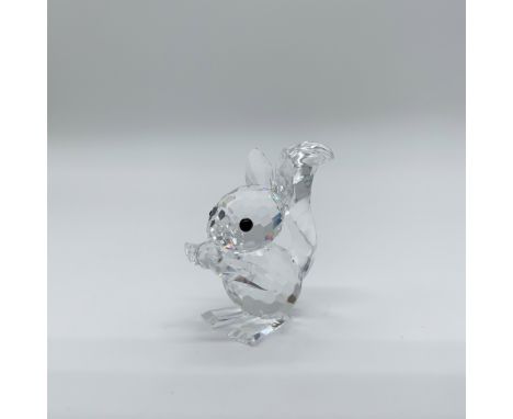This Swarovski crystal figurine, designed by Max Schreck, depicts a squirrel with elongated ears and was initially part of th