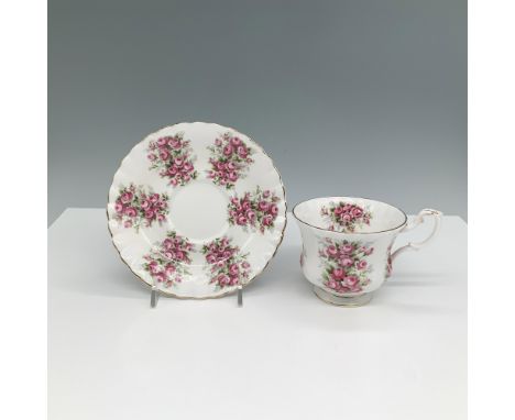 This beautifully crafted cup and saucer set is from Royal Albert's Springtime Series, featuring delicate pink roses. The set 