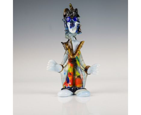 This striking Murano glass clown figurine features intricate details and vibrant colors. Standing at 7.25"H, the clown is dre