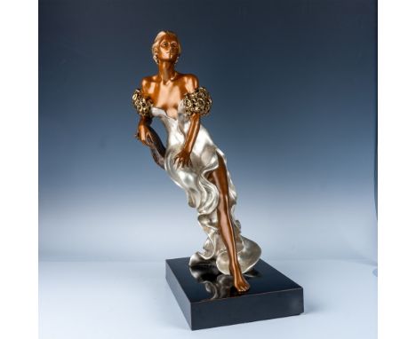 This elegant sculpture by Alice Riordan captures a serene moment of a seated woman adorned in a flowing gown. Crafted with a 