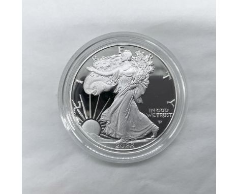 West Point Mint. The obverse side features full length of Liberty in stride. She is shown wrapped in the folds of the flag of