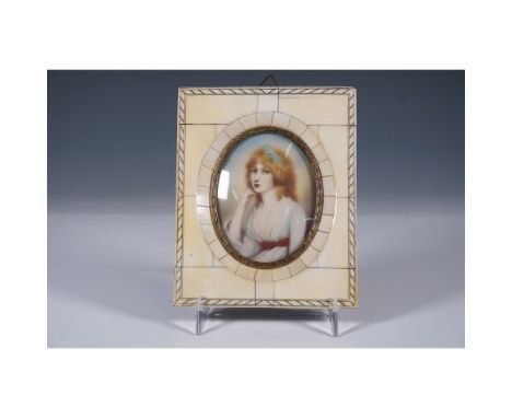 An exquisite antique miniature portrait painting depicting a young woman with flowing golden hair, dressed in a white gown wi