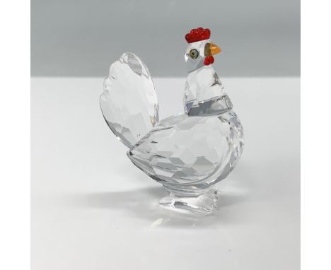 Swarovski crystal figurine featuring a faceted hen, crafted primarily from clear crystal, featuring a light siam comb and a t