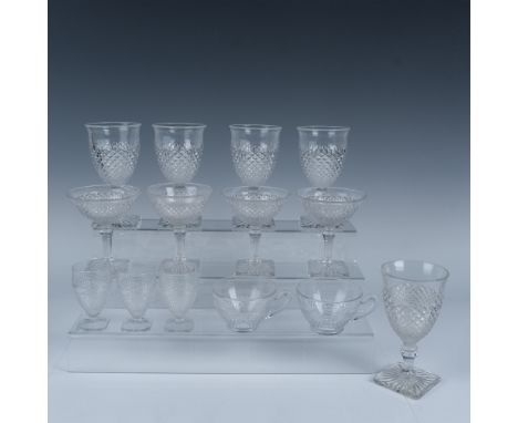 Gorgeous collection of glassware with a hobnail and diamond cut design that includes five water goblets, four sherbet glasses