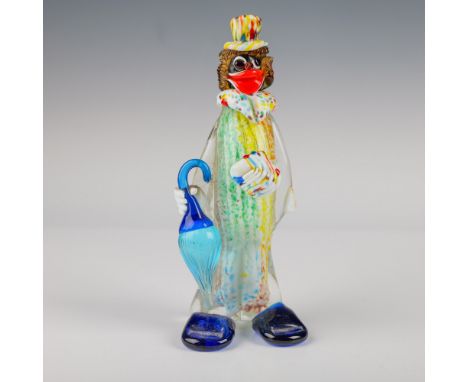 This charming Murano glass clown figurine stands at 8.75" tall, featuring a playful design with a colorful array of hues. The